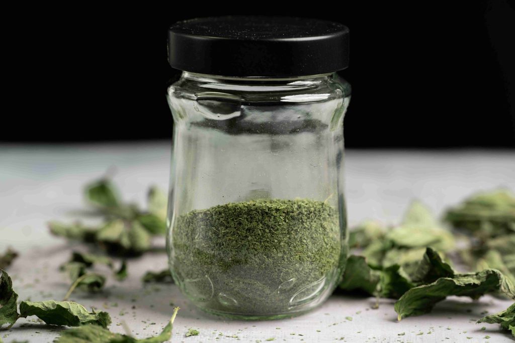 Dried mint leaves prepared for processing and storage